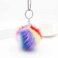 Detailed close-up of a fluffy rainbow faux fur keychain with a silver ring and leather strap - Wine Red Tone (Rainbow Mix)