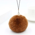 Brown faux rabbit fur pom pom keychain with silver metal clasp and phone strap decor - Brown