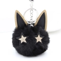 Porte-clés chat en peluche noire avec yeux étoiles dorées sur fond blanc immaculé - Fermoir Argenté / Noir