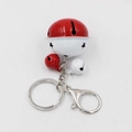 Close-up of red and white metal bell keychain with lobster clasp and keyring detail - White Red