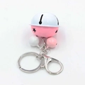 Detailed view of pink and white metal bells with star cutouts and silver lobster clasp - Pink & White