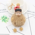 Portachiavi con bambola neonato dormiente, palla di peluche e cappello in maglia - Cachi