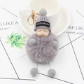 Cute sleeping baby plush keychain with grey knitted hat and fluffy faux fur pompom ball - Light Gray