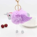 Détail du porte-clés licorne en peluche violette avec des ailes argentées - Mauve Clair