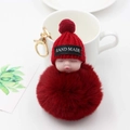 Porte-clés bébé endormi fait main avec pompon en peluche et bonnet rouge pour sac - Bordeaux