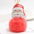 Detail of Santa Claus plush keychain with soft red faux fur ball and golden metal ring - Orange