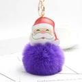 Detail of Santa Claus plush keychain with purple faux fur pompom and golden keyring - Purple