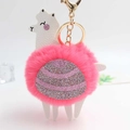 Detail of alpaca plush keychain with pink glitter finish and gold lobster clasp - Watermelon red