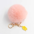Portachiavi con pompon rosa e ciondolo a forma di papera gialla con anello dorato - Diametro Pon Pon 8cm / Rosa
