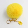 Portachiavi con pompon giallo a forma di anatra con gancio dorato e ciondolo cartoon - Diametro Pon Pon 8cm / Giallo