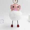 Détail du porte-clés cochon en cuir rose avec pompon blanc en fausse fourrure - 14x8 cm / Blanc