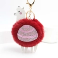 Detail of red plush alpaca keychain with glitter saddle and gold lobster clasp - Burgundy
