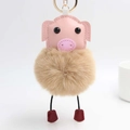 Détail du porte-clés cochon en peluche avec face en cuir rose et crochet doré - 14x8 cm / Khaki