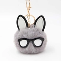Detailed view of plush rabbit pompom keychain with chic glasses and golden hook - Light Gray