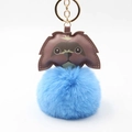 Detail of cute puppy plush keychain with blue fur pompom and golden metal ring hook - Pom Pom Diameter 8cm / Blue