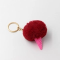 Detailed close-up of a red plush pom pom ice cream keychain with a pink cone base - Burgundy