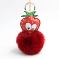 Detailed view of red plush strawberry keychain with cute cartoon leather face and gold metal ring - Wine Red Strawberry