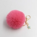 Close-up of rose red faux fur pompom keychain with blue enamel starfish charm - Deep Pink