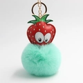 Cartoon strawberry keychain with leather eyes and soft mint green plush pompom charm - Green Strawberry Quartz