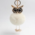 Charming owl keychain with white faux rabbit fur pompom and gold alloy details - Off White