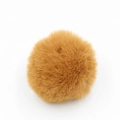 Dettaglio di un pompon soffice marrone-arancio per accessori di abbigliamento - Confezione da 8cm / Caffè
