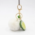 Durian fruit keychain with white plush ball and gold lobster clasp for bags - Off White