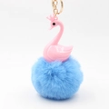 Detail of pink swan keychain with fluffy blue pompom and golden crown ornament - 14*8cm / Blue
