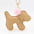 Detail of cute puppy bag charm featuring brown leather and pink fluffy fur pompom - Khaki With Hairball