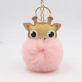 Cute faux fur deer keychain featuring a pink plush pom pom and golden ring fastener - Pink