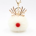 Detail of Christmas reindeer plush ball keychain with rose gold antlers and metal ring - Off White
