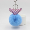 Mermaid tail plush keychain with sky blue faux fur pompom and iridescent scales charm - Blue