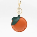 Creative orange-shaped PU leather keychain with gold metal ring and green leaf detail - Without Tag