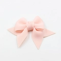 Detail view of light pink fabric bow charm with fine texture for shoes and bags - Pink