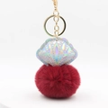 Laser PU shell and burgundy faux fur pompom keychain with golden metal clasp - Burgundy