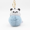 Close-up of a panda faux leather keychain with a large light blue fluffy pom-pom and gold ring - 10x8cm / Haze Blue