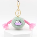 Llavero de monstruo de peluche verde menta con trenzas rosas y cierre dorado - verde claro