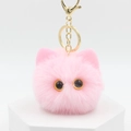 Pink plush cat ear keychain with soft fur texture and gold metal lobster clasp - Pink
