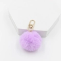 Soft light purple pom pom keychain with a gold spring hook on a white display block - Light Purple