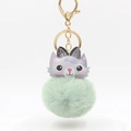 Mint green plush pom-pom keychain with cute cartoon cat charm and golden hardware - Light Green