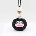 Close-up of fluffy black monster plush keychain with pink mouth and golden clip - Black