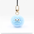 Cute light blue furry ball keychain with cartoon face and gold metal clasp on white stand - Sky Blue