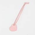 Pink heart-shaped leather keychain with matching strap on a clean white background - Pink