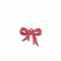 Dettaglio di un ciondolo a fiocco rosso lucido in resina con anello per gioielli fai-da-te - Fiocco Elegante