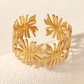 Detail of 18K gold plated open cuff bracelet with tropical leaf hollow design - Leaf Open Bangle (BS-J5549G)