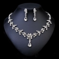 Detail of silver bridal jewelry set with water drop rhinestones and floral necklace - Necklace And Earrings Set (NS-J6482S) / Silver