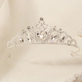 Macro detail of silver heart crown tiara with sparkling crystal rhinestones - Silver