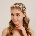 Elegant bridal hairband featuring silver leaves, white faux pearls and crystals on model - Silver Forest Style Pearl Leaf Hair Accessory (HS-J6329S)
