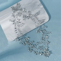 Elegant silver bridal hair vine with sparkling crystals on white marble surface - Silver Handmade Crystal Vine Hair Accessory (HS-J6702S)