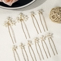 Macro view of 11 golden U-shaped hairpins with white pearl flower decor on white background - Gold Pearl Flower Array Hair Stick (HS-J7289G) / 10 Piece Set