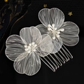 Detailed macro view of silver wire floral hair combs with delicate white pearl embellishments - Silver Petal Style (HS-J6708S) / Single Pack / Silver